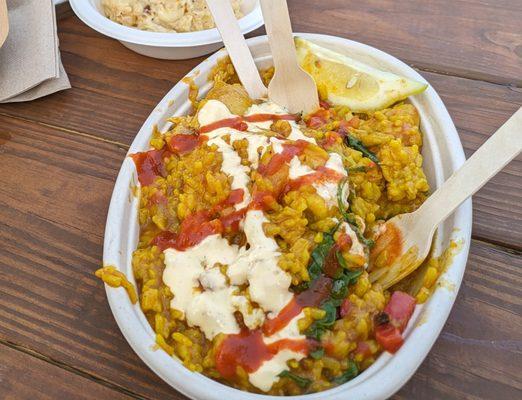 4 star Paella at BottleRock 2024. Moist chicken, good flavor, rice a bit too soggy, only 1 shrimp.