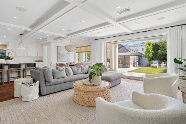 Open kitchen and living area opens into the backyard for a connected outdoor experience.