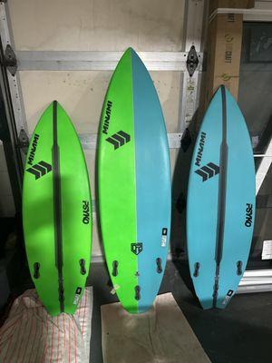 Two kids boards and an adult board in the middle