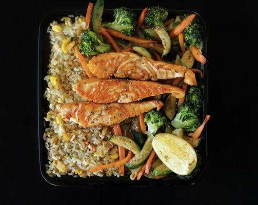 Salmon with fried rice and veggies