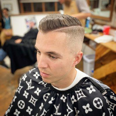 Skin fade combover with hard part