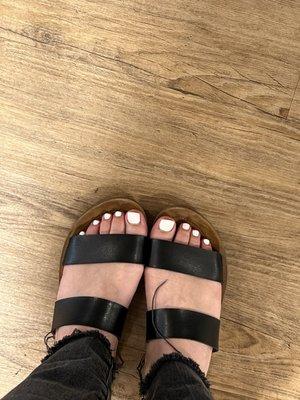 My after pedicure toes... she didn't even paint the whole big toe nail...