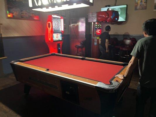 Pool table and punching maching