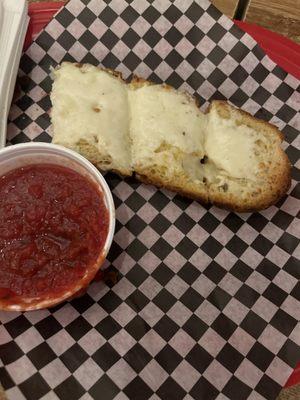 Cheese bread with marinara sauce.