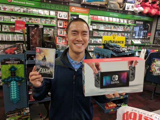 Picked up my Nintendo Switch and a copy of The Legend of Zelda: Breath of the Wild. Thanks to store associate Devan for the photo!