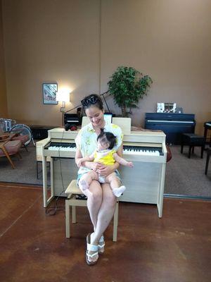 Sitting in front of the digital piano (Roland) today, and baby's first piano!