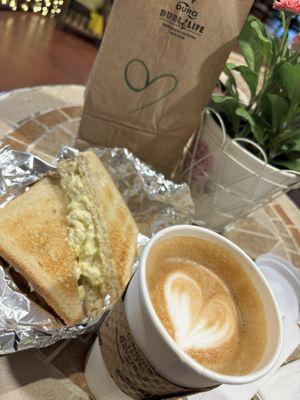 Egg salad sandwich and cappuccino