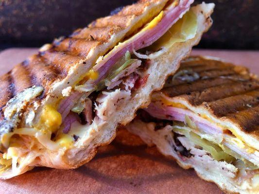 CUBAN-Honey roasted ham, swiss cheese, pickles, yellow mustard & a healthy portion of slow smoked pork pressed & toasted. www.xyzbbq.com