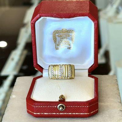 Stunning 18KT yellow gold estate ring from Cartier called the "Golden Helmet" this textured diamond ring dates from the 1990's.