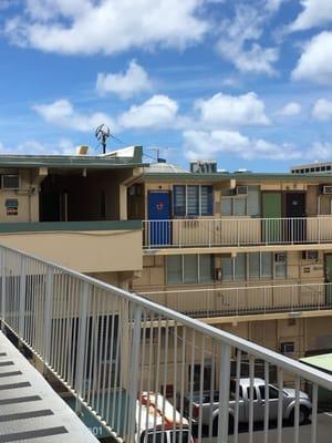 View of the shop from rooftop parking, ramp on Dillingham