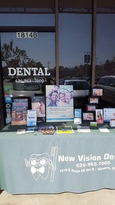 nice informational table outside before going in also available coupons for round the area and Dental products as well very useful