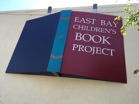 Awesome sign in the shape of a book