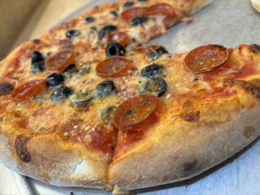 Black olives and pepperoni pie