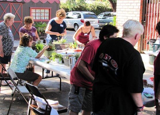 Fairy Garden class taught right outside our store.