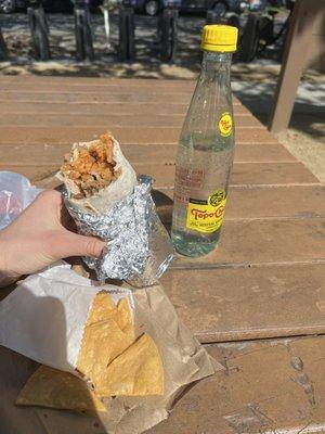 Medium chicken burrito, chips and topo chico. SO good