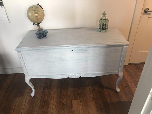 100 year old chest in excellent condition. Inside like new. Chaulk painted  with 4 coats of different shades of blue and gray and waxed.