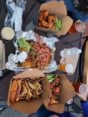 Chili Cheese Nachos, Hotdog and fries, Buffalo and Sweet and Spicy Wings