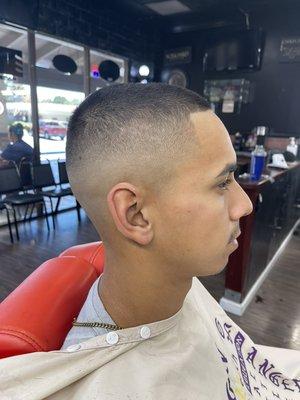 Mid skin fade , 3 on top with line up