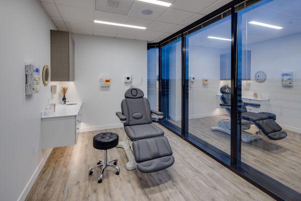 An example of one of our exam rooms, which have floor-to-ceiling one way glass.