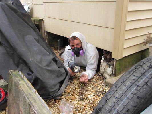 Craig going in a crawl space that most inspectors would not enter