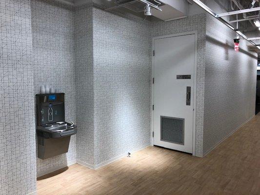 Women's locker room includes showers, towel service, and lockers