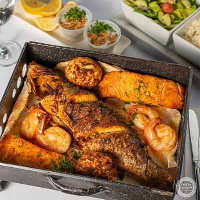 Sea food for 2
Salmon/ shrimp / crab cake / choice of red snapper or Bronzino salad and rice