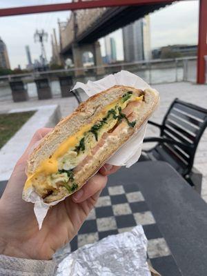 Egg, cheese, spinach and tomato on a fresh roll. 10/10