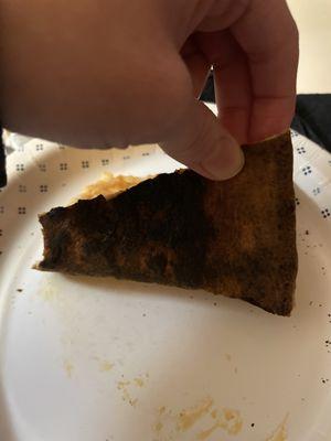 Completely BURNT pepperoni pizza! It makes it so bitter!