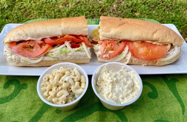 His & Hers half-sands!!! Tuna with lettuce, tomatoes, onions, and peppers w/macaroni and potato salads