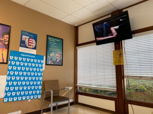 Waiting area open again with seats and tv.