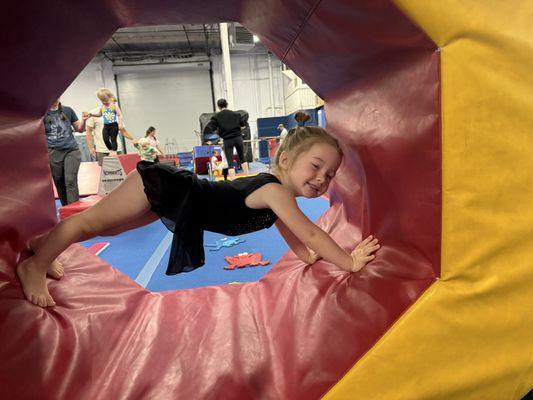 My littlest in her class, building strength and flexibility.