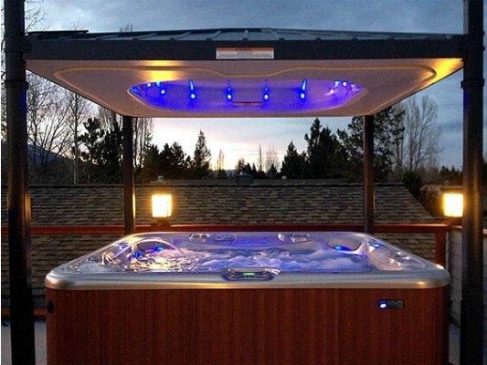 Turn your backyard hot tub into a relaxing refuge with the Covana™ Automated Cover &  Gazebo In One.