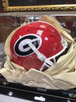 Our fav Gainesville gold place and they have a Vince Dooley helmet!