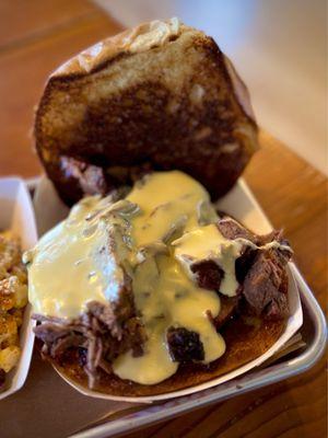 My Brisket Sandwich with cheese sauce - fantastic!! Some of the best brisket I've had outside of Texas!