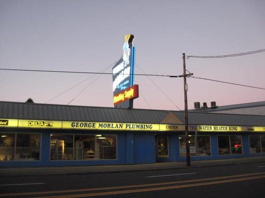 George Morlan's S.E. store by night in that area that is "very S.E. Foster" with funky watering holes and porn shops