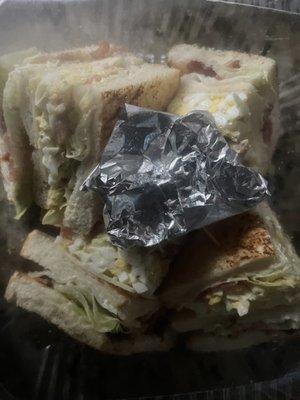 Egg salad club - not on menu (pickles wrapped in foil)