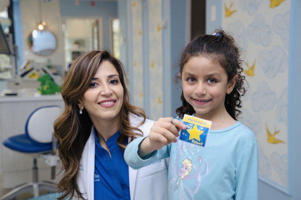 Dr. Jamshidi and her favorite Star Patient stickers!