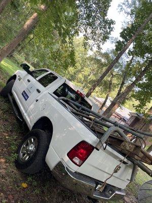 A small demolishing job of an old playground set that was cut up with a grinder, and packed in the truck to get dumped.