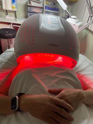 Red light therapy treatment for fine lines, wrinkles, dark spots, texture, and more.