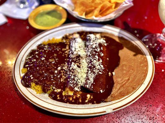 Chicken Mole enchiladas with Mole over rice