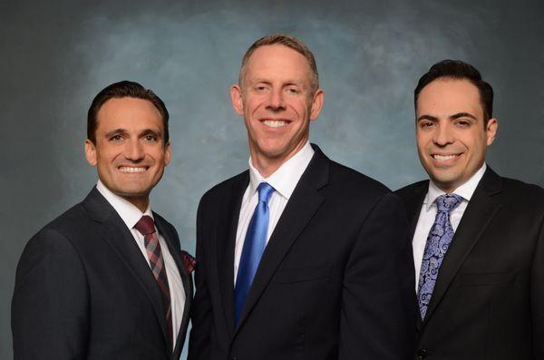 Attorneys George Palaidis, Gary Gelch, and Omar Cardenas