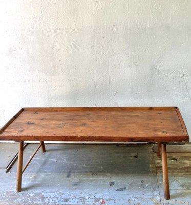 SOLD Rustic coffee table. Beautifully aged, well worn wood. 62" wide x 22.5" deep x 19" high.