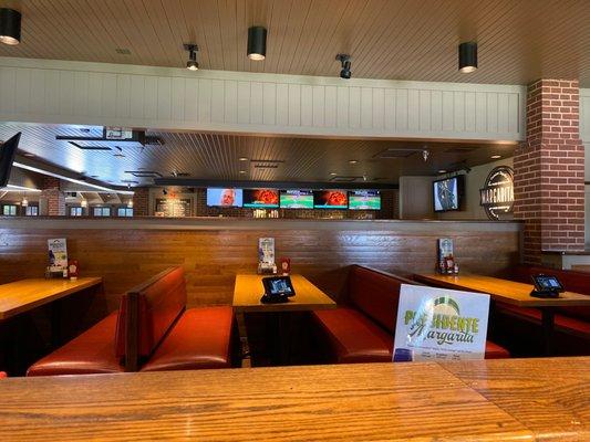 Spacious clean seating and sports bar set up