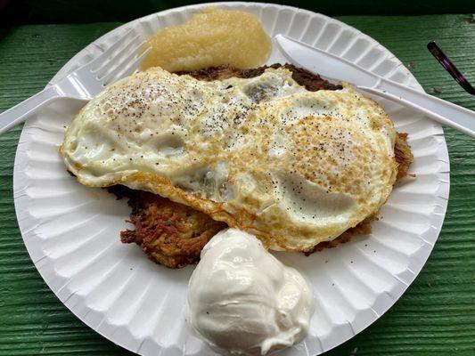 Polish breakfast. Two eggs on two potato pancakes