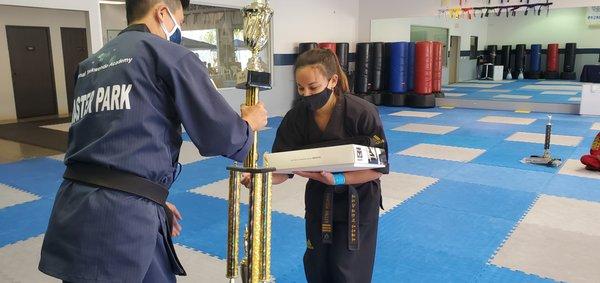 Master Vanessa receiving her 4th degree black belt award