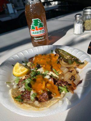 Tripas tacos and Jarritos