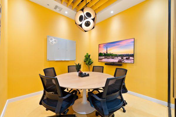 chic and modern conference room great for team of 4-6 may be rented by the hour