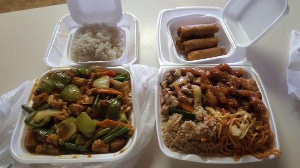 Curry chicken.  Regular lunch order with orange chicken. Egg rolls.