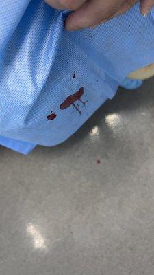 Still dripping blood on new gown