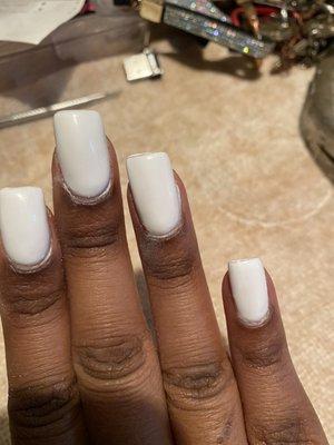 This is how the nail tech let me walk out. As you can see, the shape is crooked. & the polish on the ring finger is super jacked up.